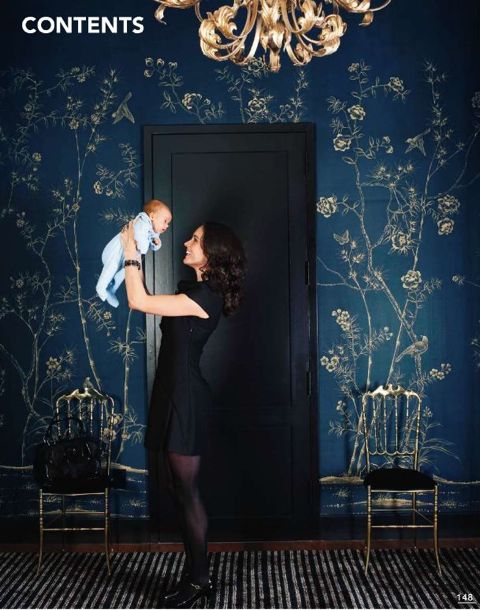 A light Chinoiserie mural stands out against the indigo wall - we love how the brass accents add a level of drama and luxury in this space. We want it in our own home. ! ( La Dolce Vita ).