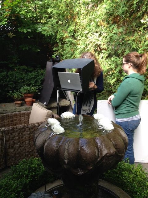 At the photo shoot, photographer Donna Griffith checks her lighting and image cropping before taking her superb photographs. 