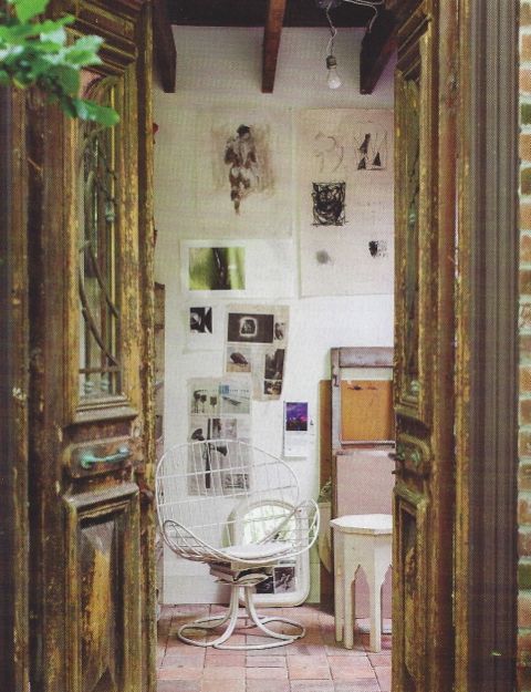 Egyptian Deco doors lead into Theresa's studio from the stone courtyard. 