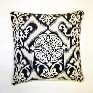 Accents of ikat in a black and white palette is a subtle way to introduce this pattern into a space. ( Jar Designs )