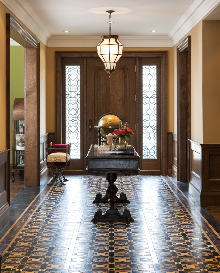 This entryway makes a strong impression with its intricate marble mosaic tile patterns. (Casey Design/Planning Group Inc. - photograph by Ted Yarwood)