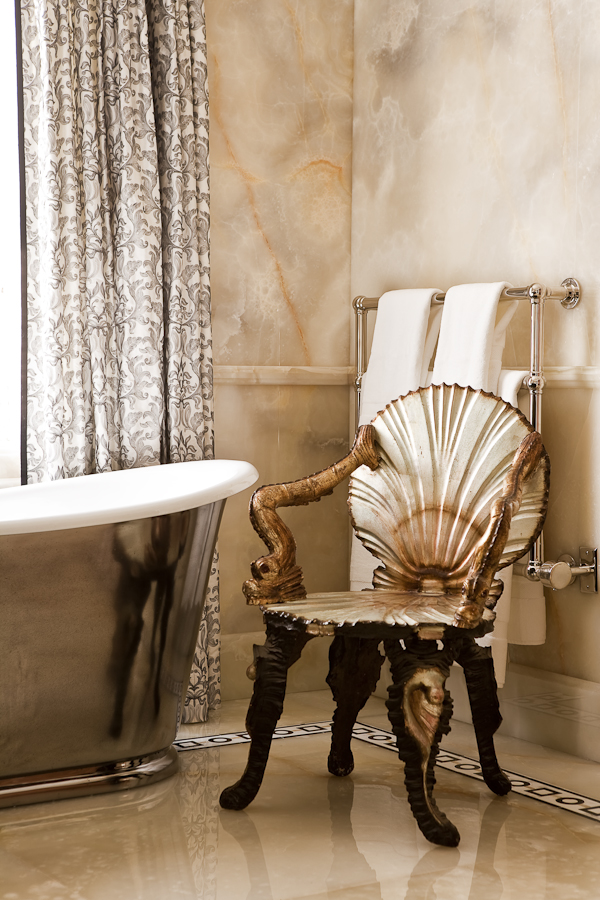Neutral marble flooring with a graphic border creates a sense of luxury and elegance in this master ensuite (Casey Design/Planning Group Inc. - photograph by Ted Yarwood)