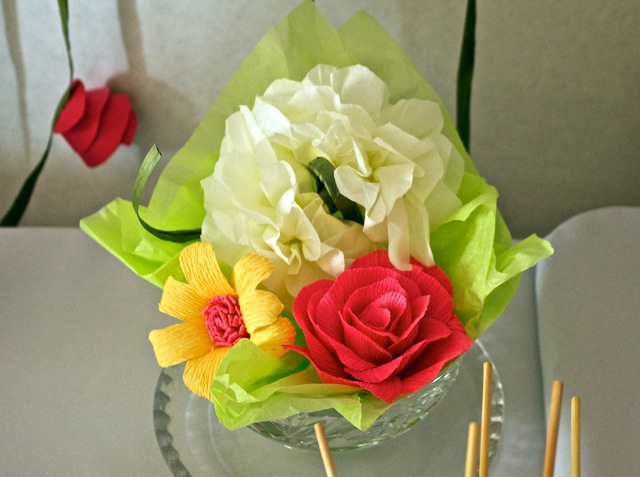 Some snapshots from the wedding. These handmade paper flowers are just as delicate and beautiful - and last longer - than freshly cut flowers! For their animation work, please visit www.sparkheadnewmedia.com