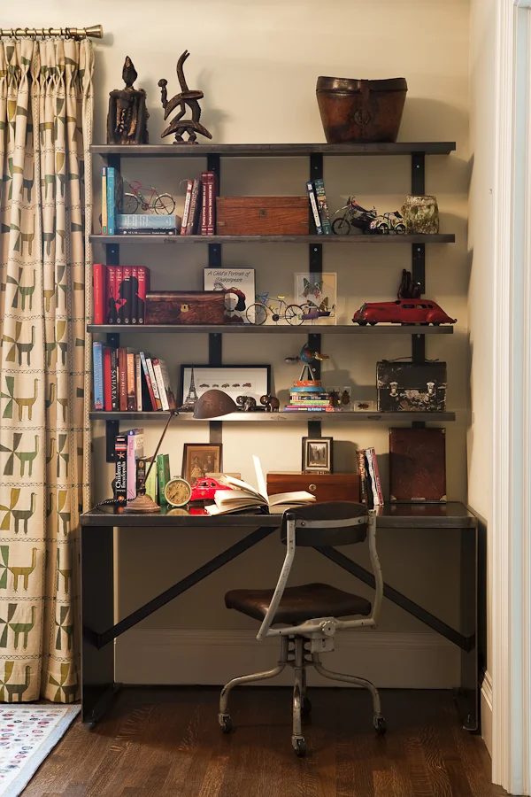 Industrial antiques create a unique sense of character to this space. Juxtaposed with colourful accessories, this home office is playful and inviting. (Casey Design / Planning Group Inc. - photograph by Ted Yarwood)