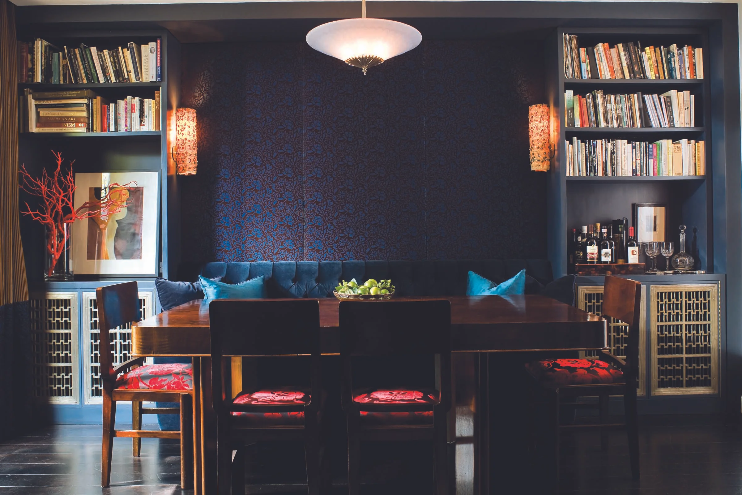 The varying textures in the indigo millwork, sofa and pillows make this space feel layered and dramatic. We love pairing indigo with natural woods - it is a match made in heaven! (Casey Design / Planning Group Inc. - photograph by Ted Yarwood)
