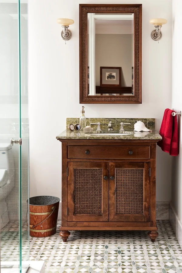 This Ensuite designed for a teenage boy is masculine but not boring - &nbsp;inspired by the British Raj, this ensuite has a "clubby" feel to it. &nbsp;The &nbsp;key elements are the patterned green, custom floor tiles and coordinating marble top, th…