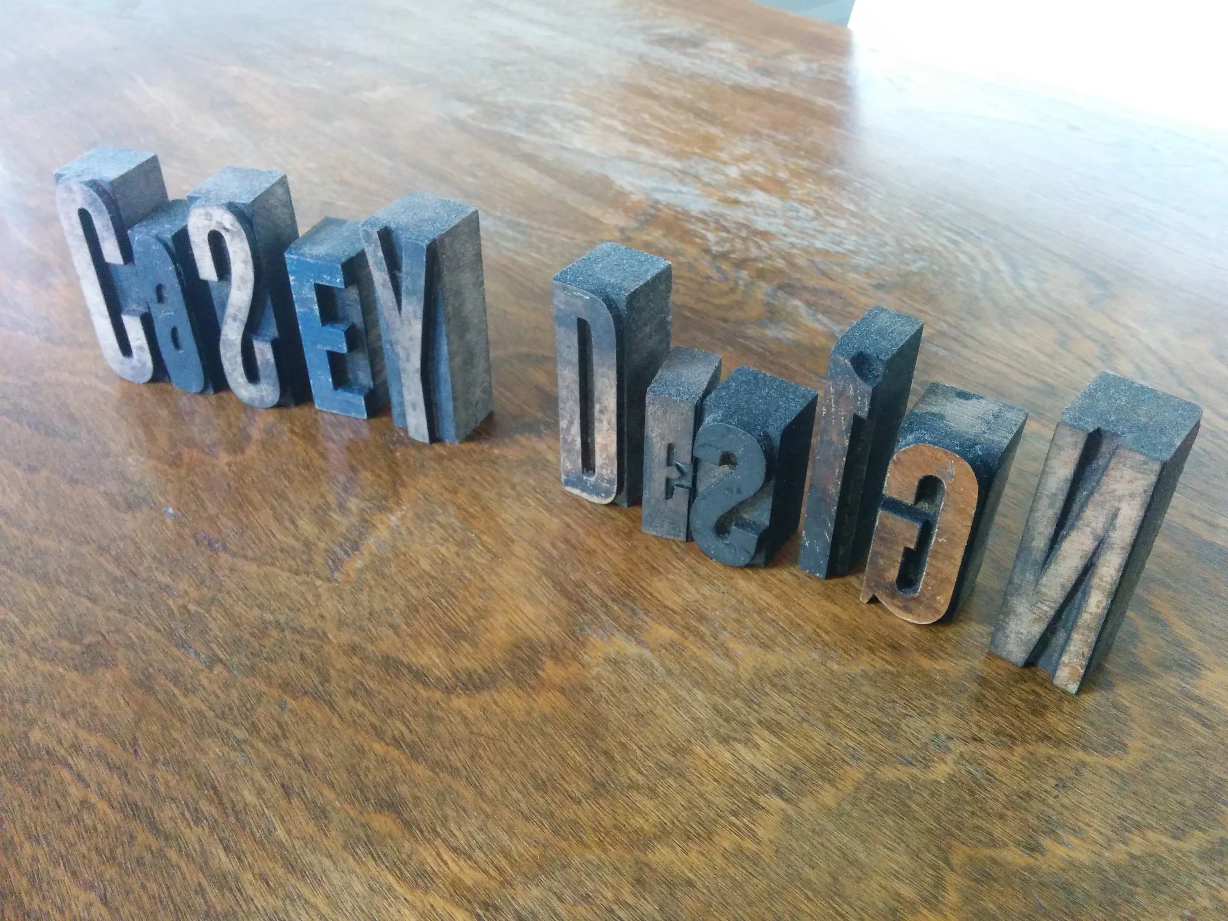 These are vintage "Casey Design" printer wood blocks, probably from the turn of the century.