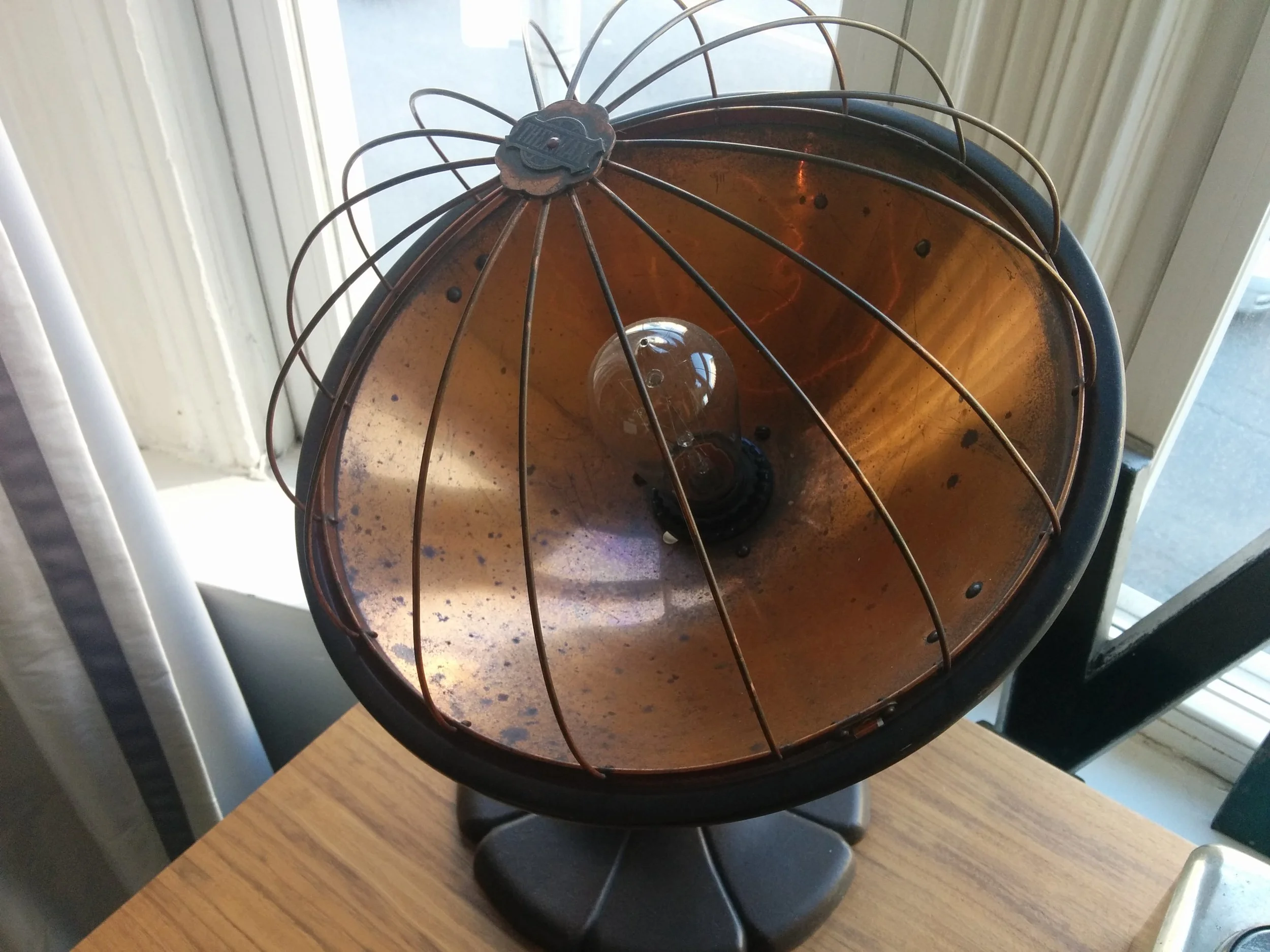 This vintage lamp is a rare find and definitely an eye-catcher because of it’s unique form. 