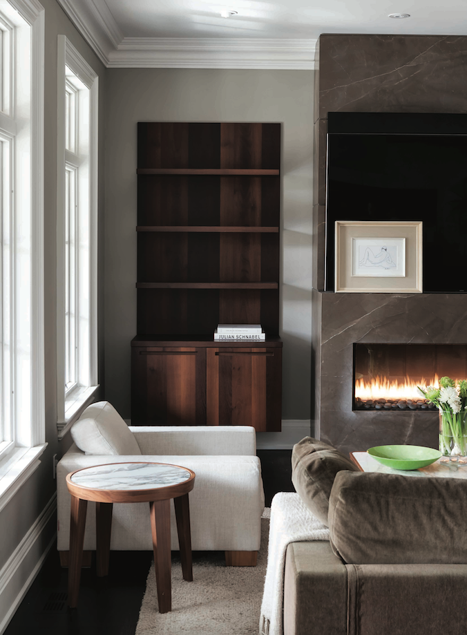 Client's family room with flush mounted TV above fireplace. 