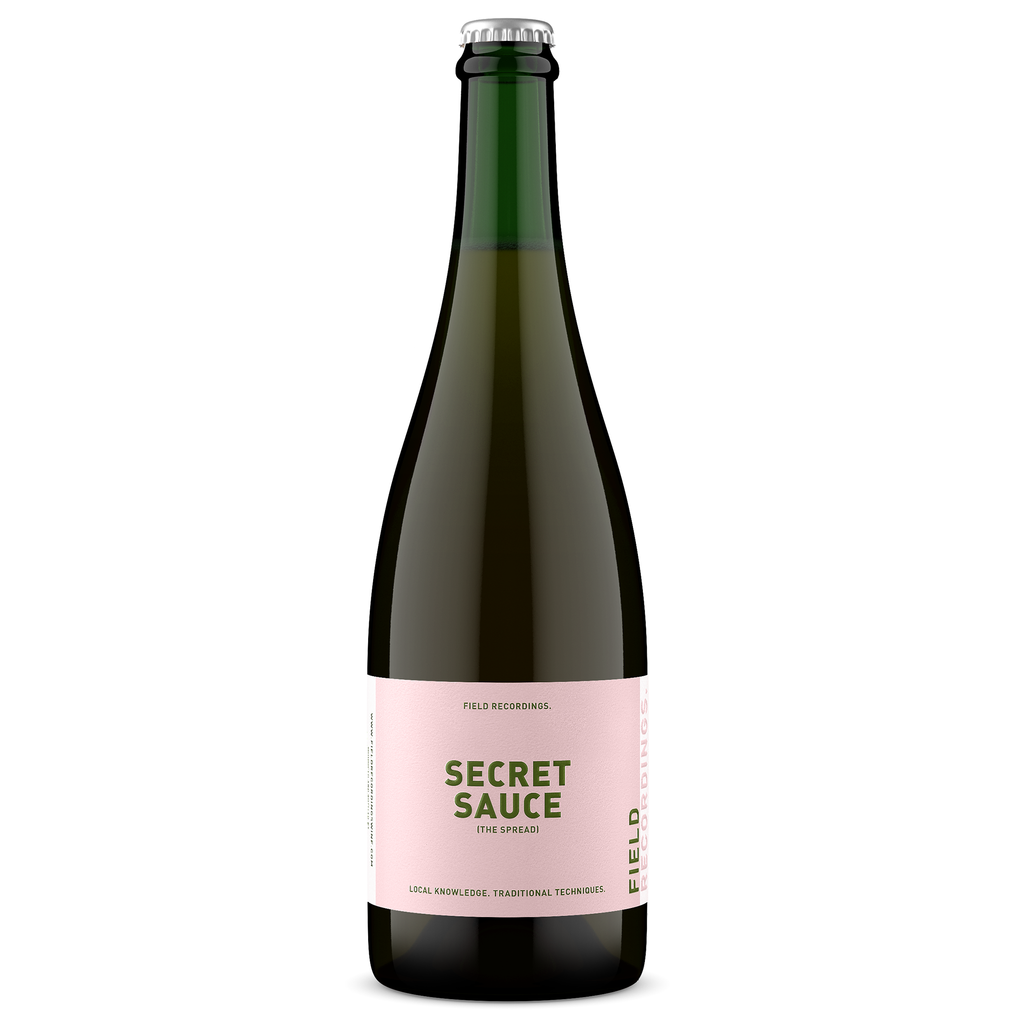 A photo of Field Recordings Secret Sauce rose, a sparkling wine with green glass and a pink label.