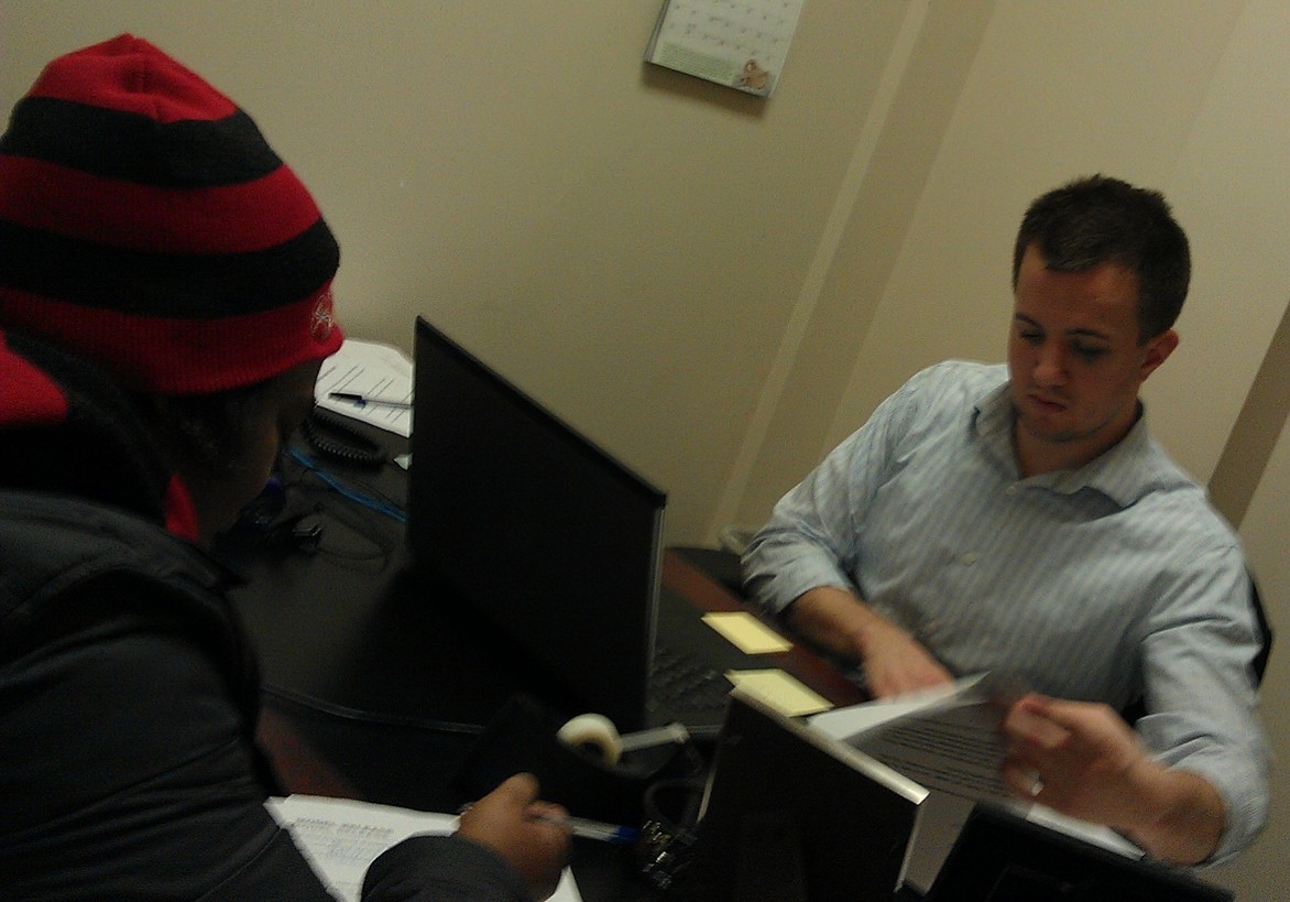 Austin Root (r) with client
