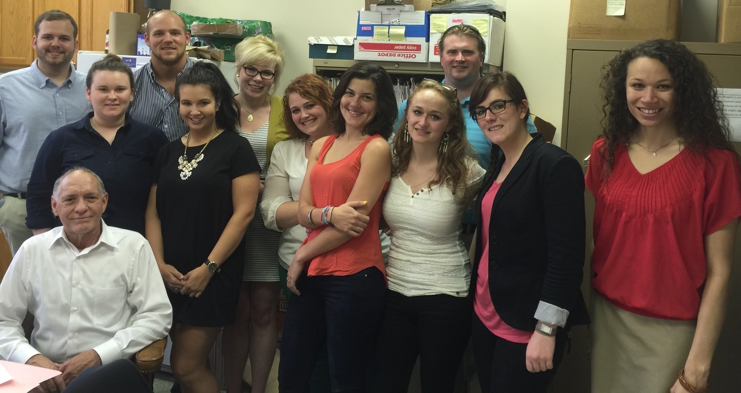 Back row: Nathan Vos, Nicholas Gral, Alexandria Quinn, Lucas Sterbick Front row: Molly Hammer, Monika Sehic, Shelby Bird, Marie De Franca, Mathilde Declercq, Caroline Alet, Erin Lain (Note: Marie, Mathilde and Caroline are French exchange students.) Seated: Linton Carney, Chief Legal Officer, The Project