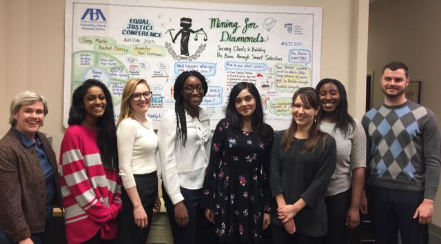 George Washington Law students with Managing Attorneys Kathleen Legendre (far right) and Jesse George (far right).
