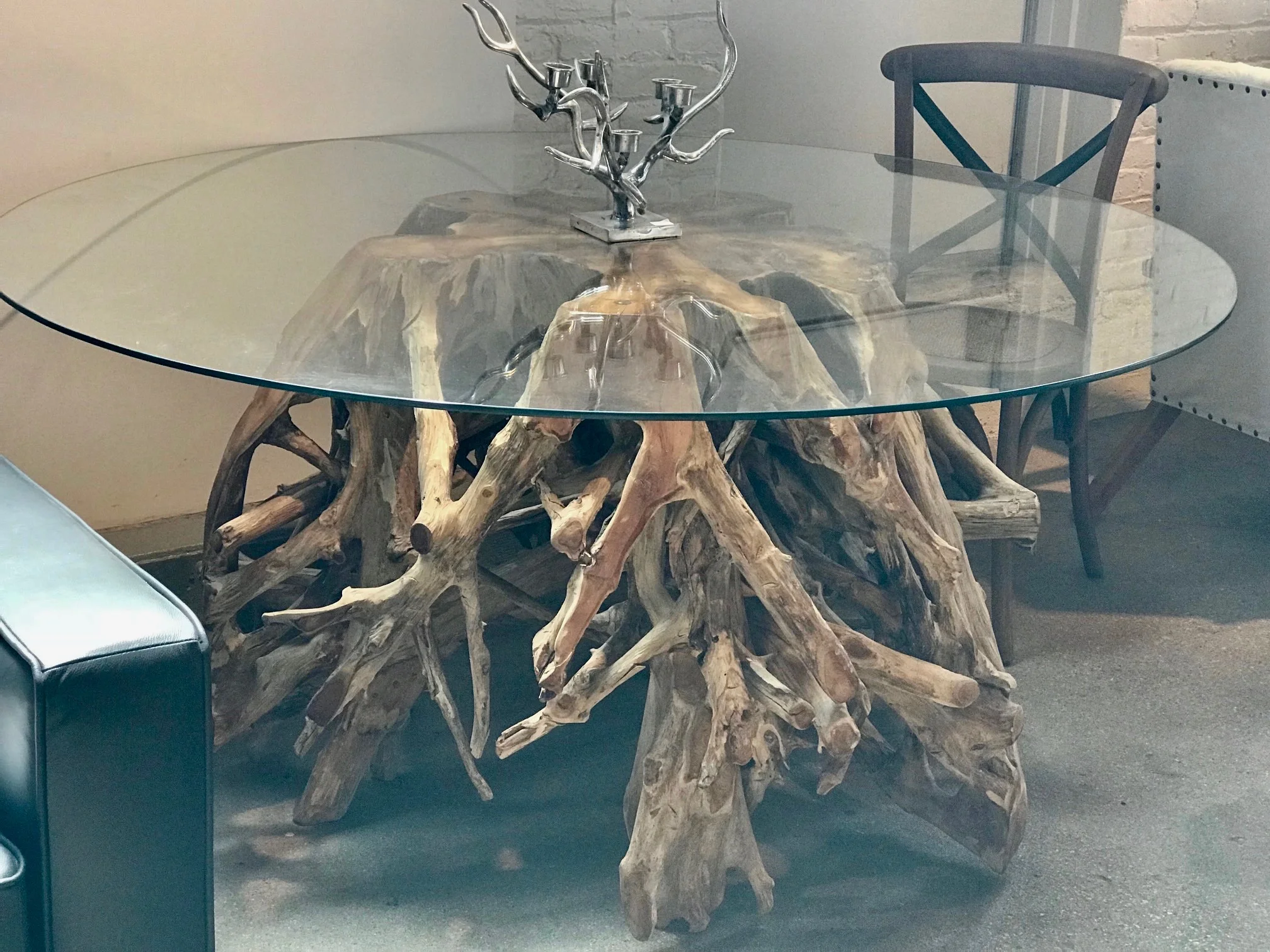 teak root dining table with glass top. Blue Moon Furniture store in winnipeg.jpg