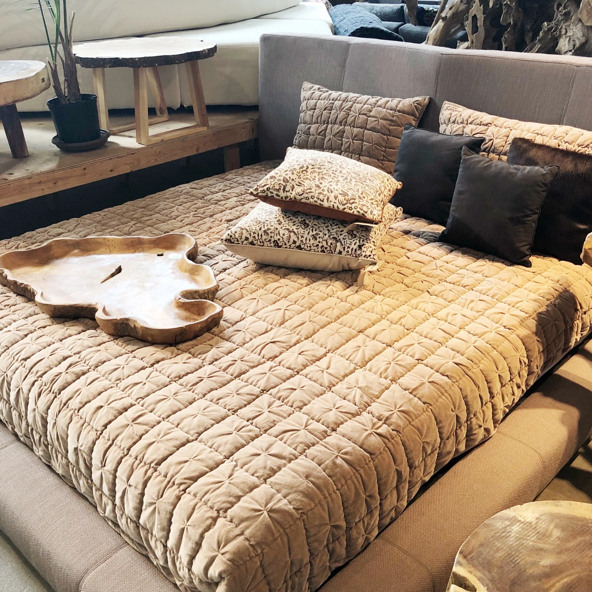 curved upholstered platform bed. blue moon furniture store in winnipeg.jpg