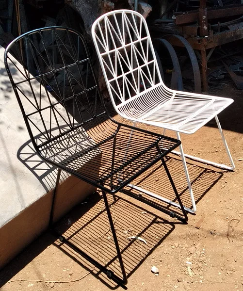 black and white wire dining chairs.jpg