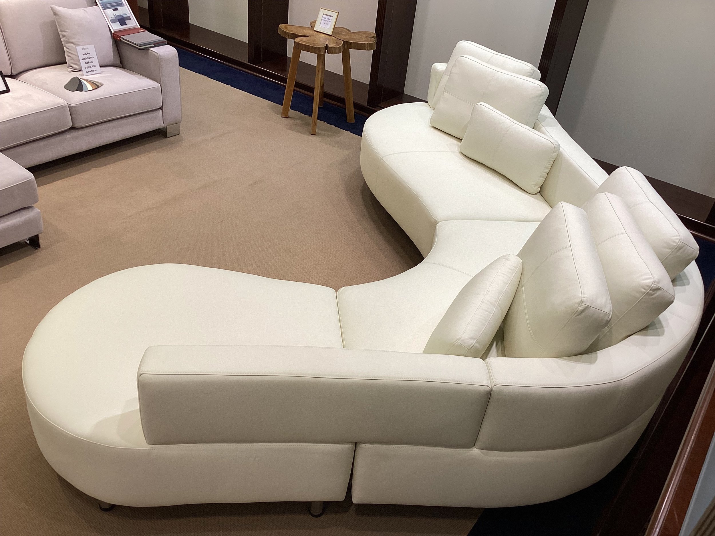 Blue Moon Furniture Hardwood Frame Free flowing leather Sectional.jpeg