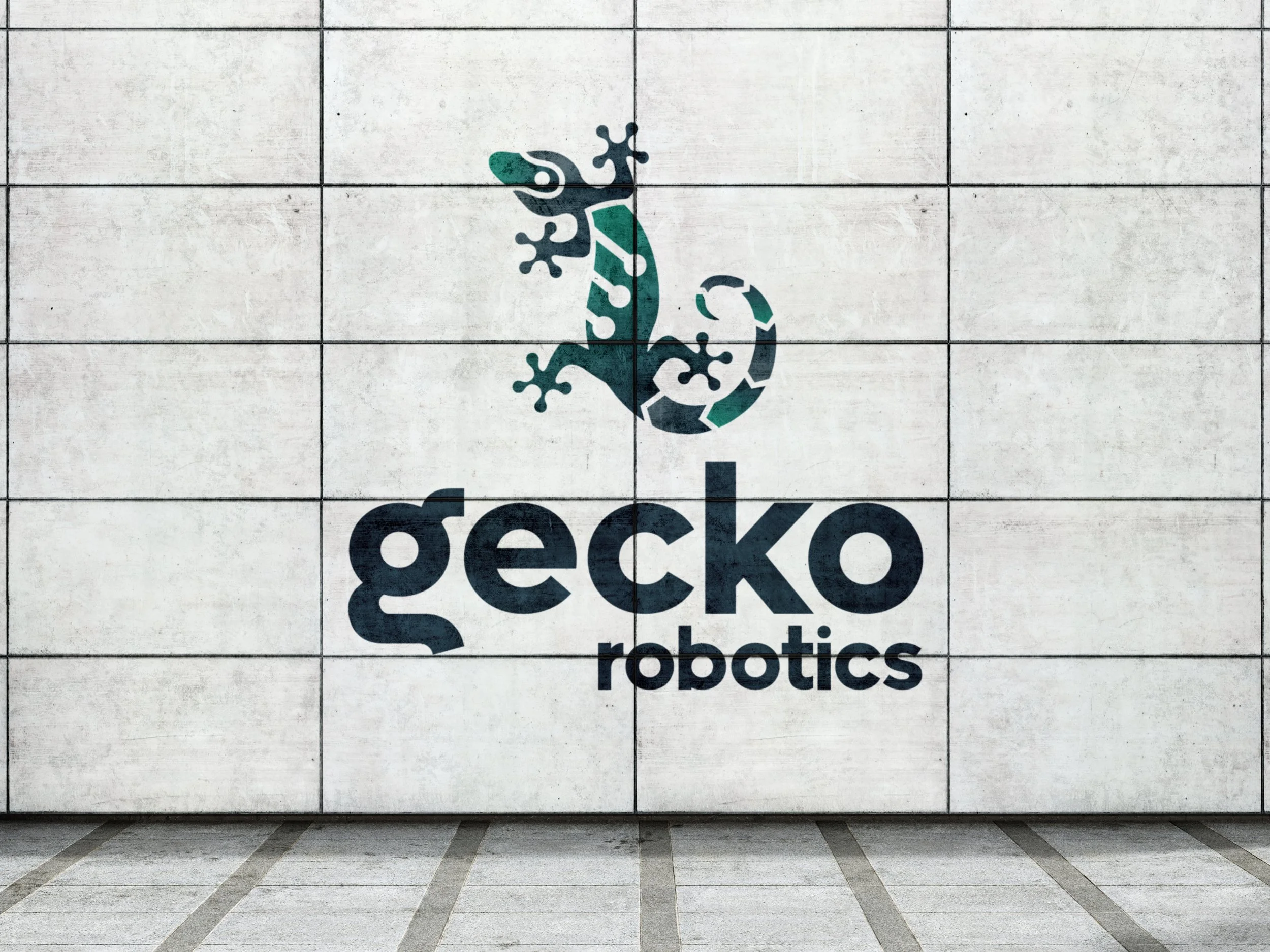 Gecko Logo-Cement Wall.jpg