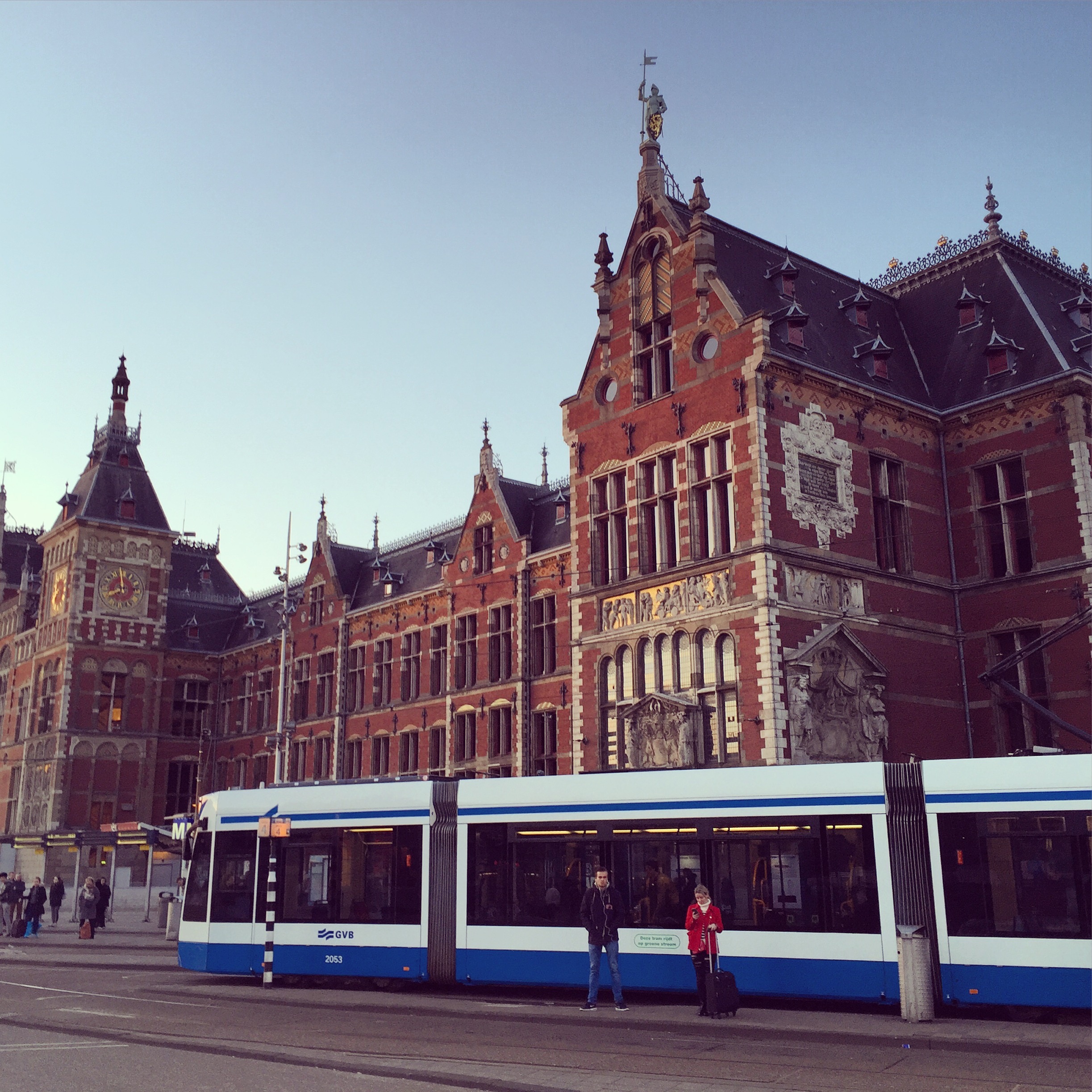 A tram in front of Amsterdam Centraal Station