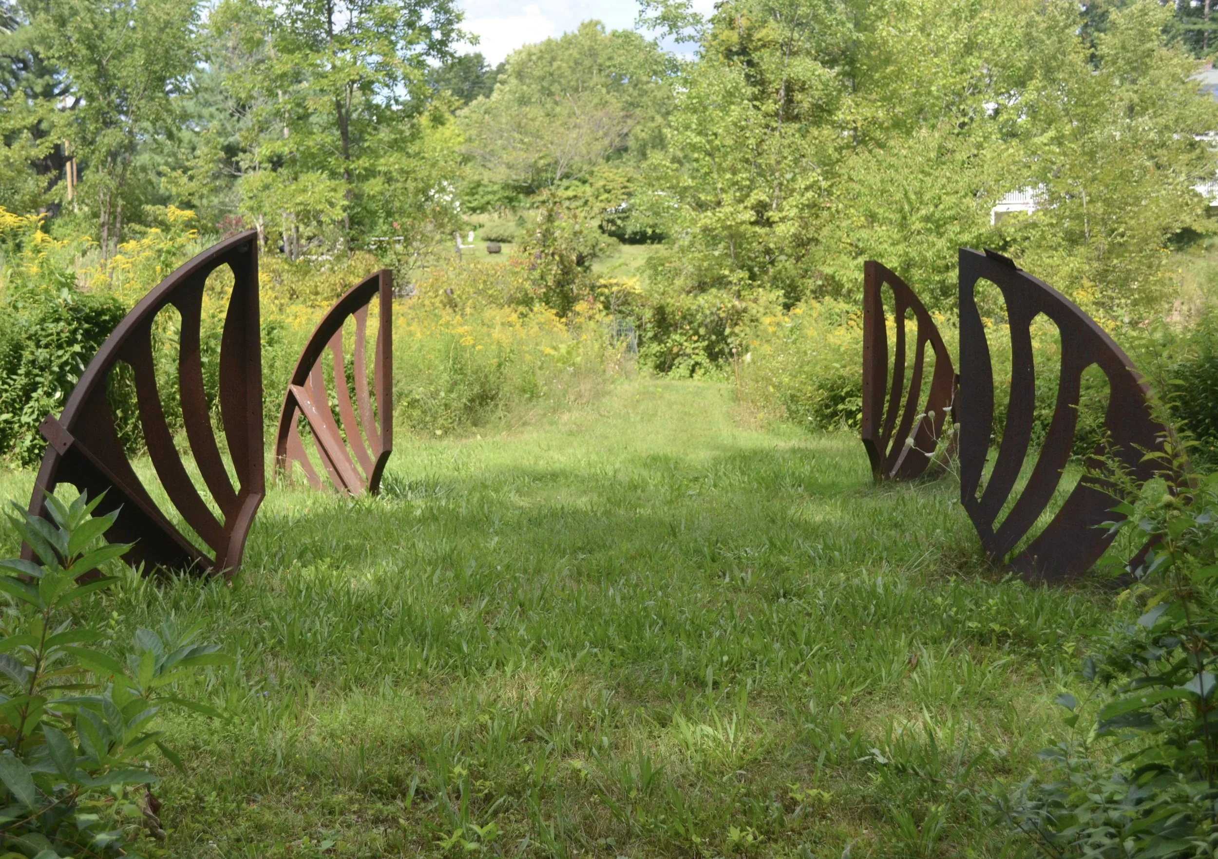 "Ground Space" by Scrap Wrenn –– Stand in the center, feel the energy created by the forms that surround you.