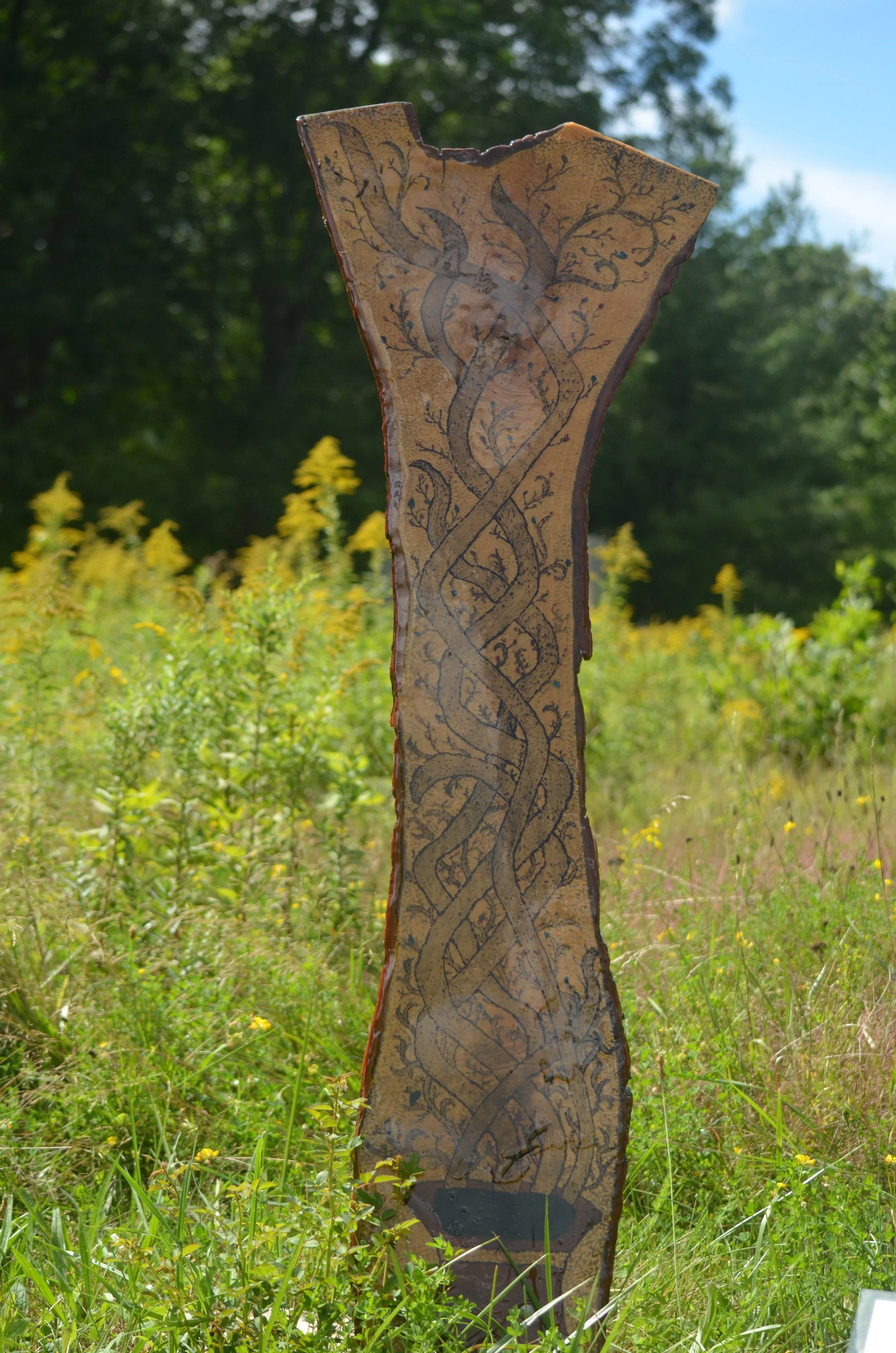 "From One Source" by Harlan Rieur –– From one flower, ten thousand seeds.