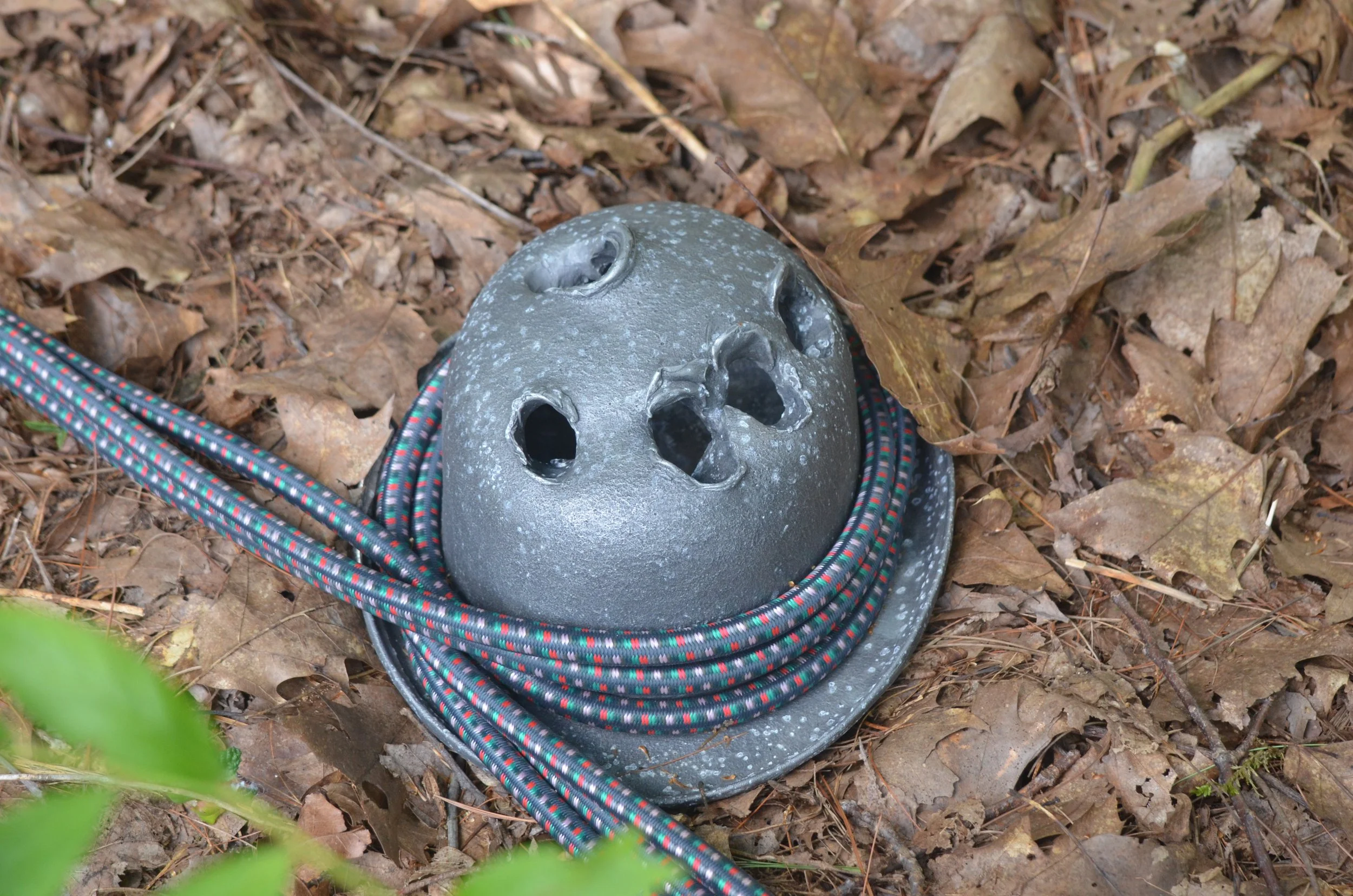 From "A Father for Every Occasion" by Zach Gabbard –– Three hats, cast in metal, an artist's inheritance.