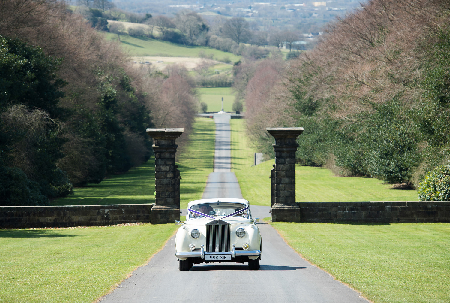 A wedding car approaches Hoghton Tower