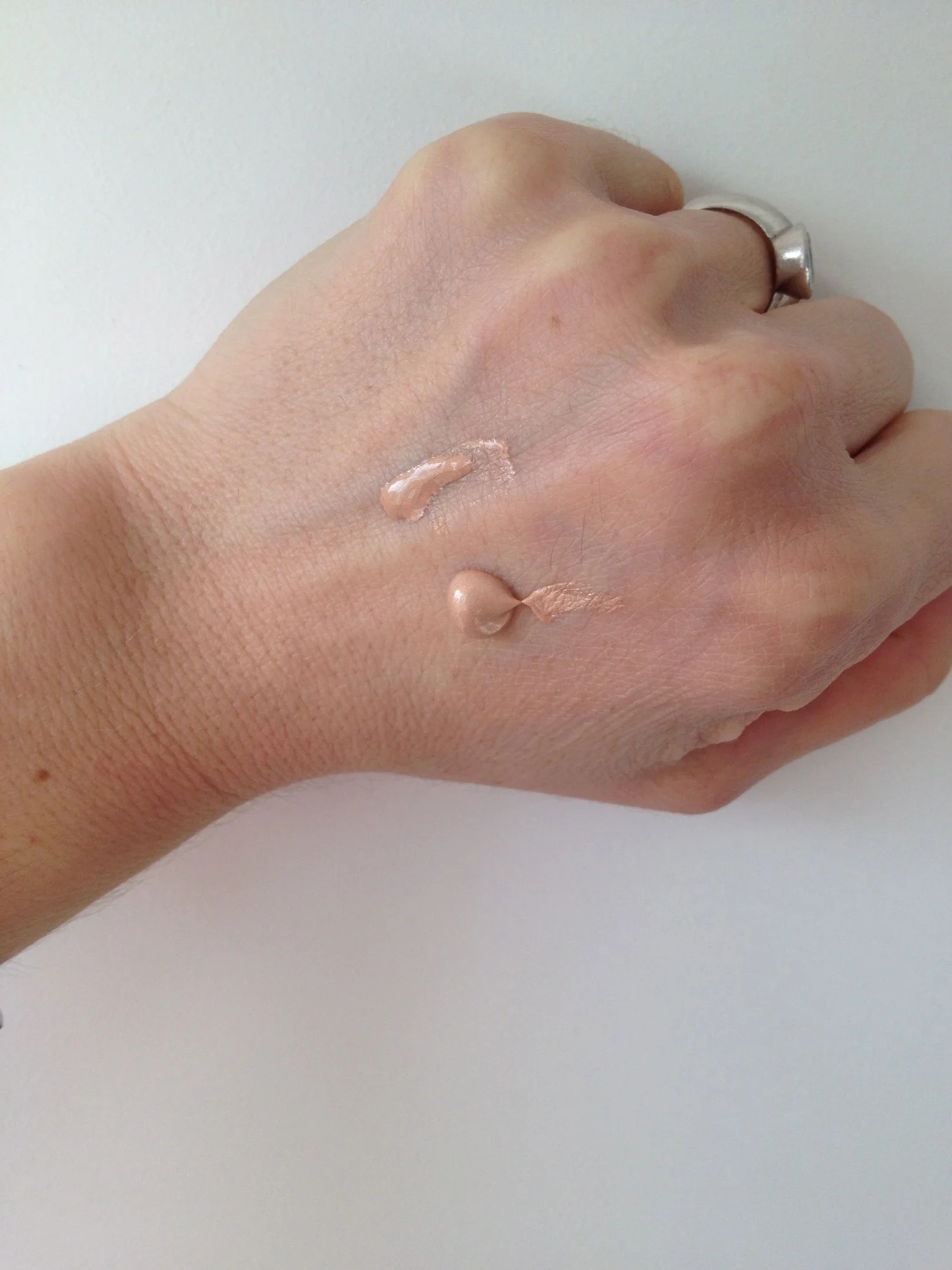 Top: Revlon in Bare Light, Bottom: Becca in Opal