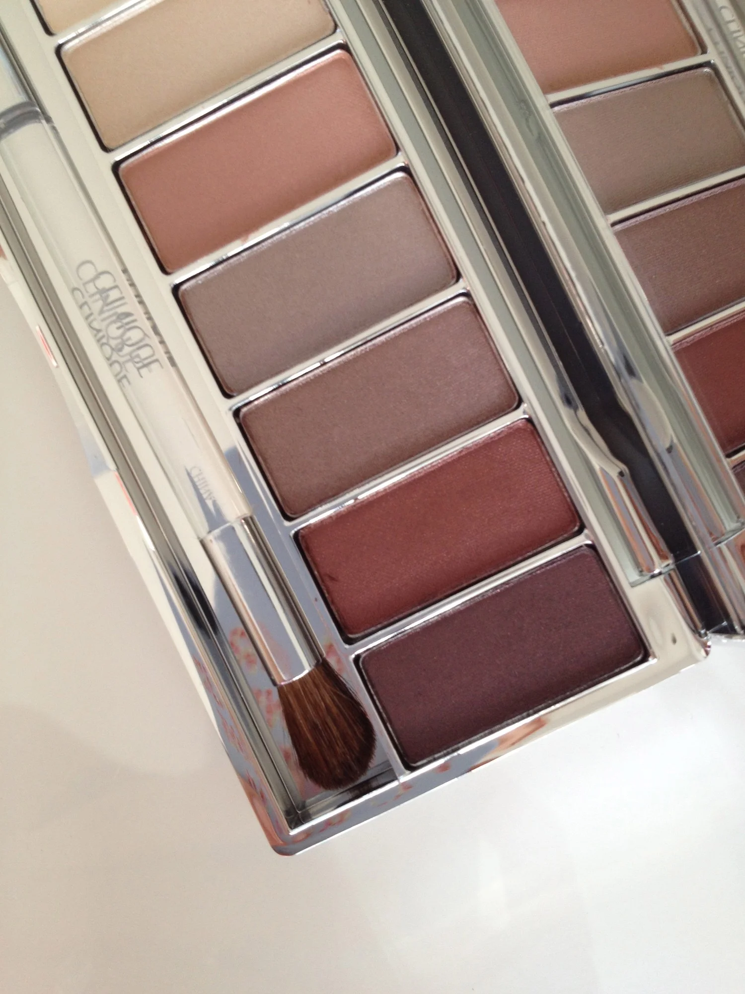 Colours L-R: Light shade of Neutral Territory duo, Light shade of Day into Night duo, Brown shade of Polar Blue quad, Hazy, Black Honey and Dark brown shade of Morning Java quad.