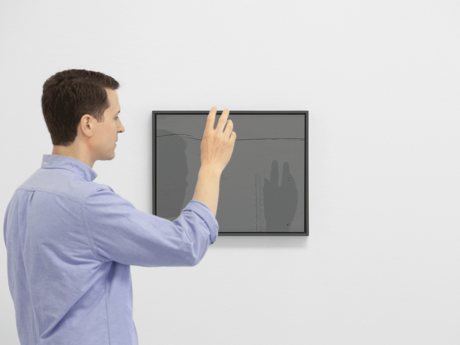 James Johnson A Faithful and Convenient Machine for Taking Silhouettes 2013 20 x 16 in. plywood, paint, frame, light, viewer's silhouette Installation view, Fiat Lux , The Print Center, Philadelphia, PA, 2013