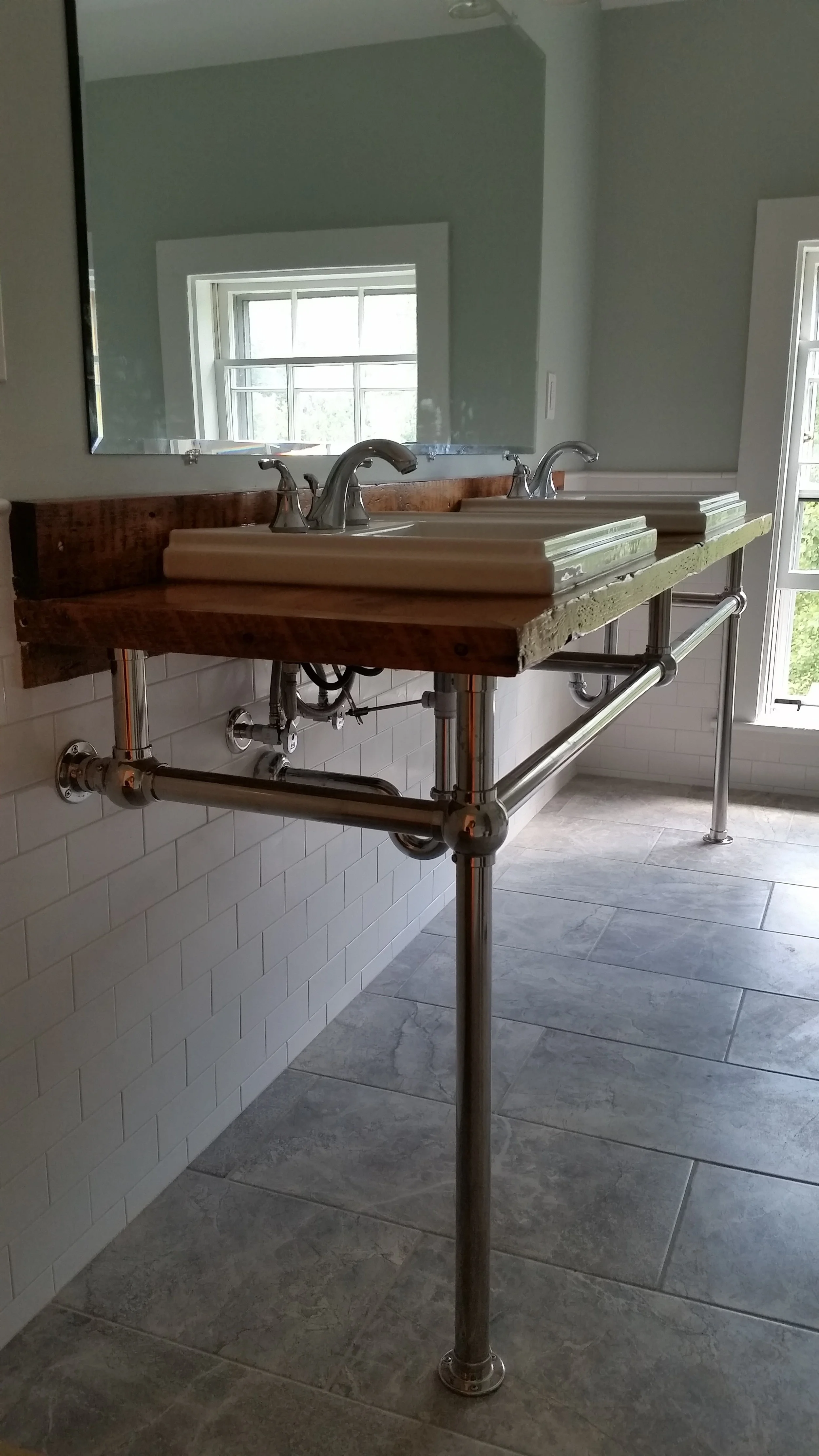 The kids sink - the wood had original carpenter marks in it (which were, unfortunately, right where those sinks had to go. Ah well.) 