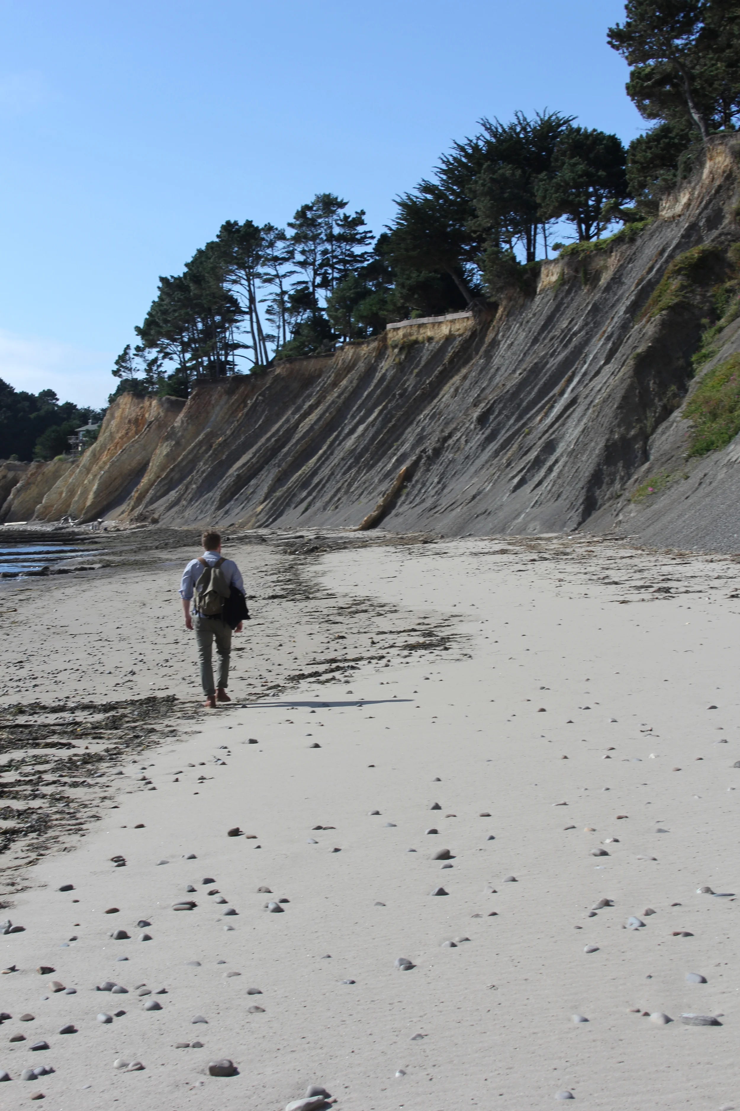 Sean McFarland hikes the coast while on a short break from the studio. 