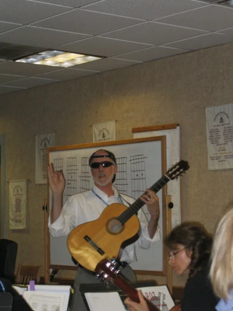 Clark teaching bar chords - cool!.jpg