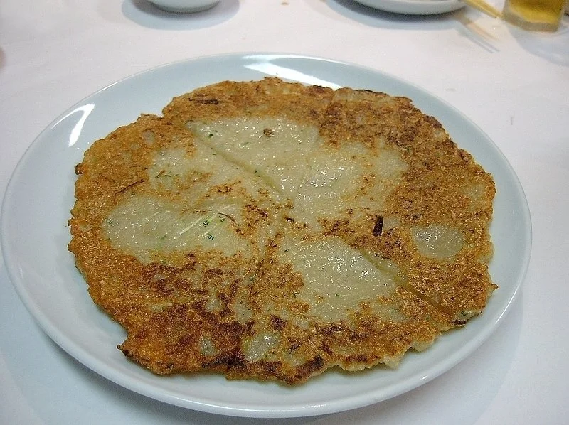 Photo Credit: https://commons.wikimedia.org/wiki/File%3AKorean_potato_pancake-Gamjajeon-01.jpg