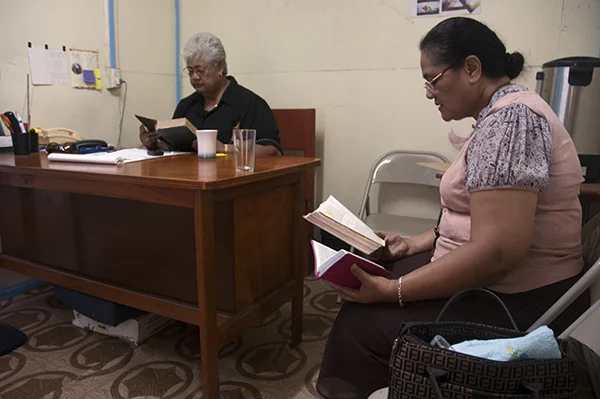 Healing ministry members comparing Bible translations, 2011.