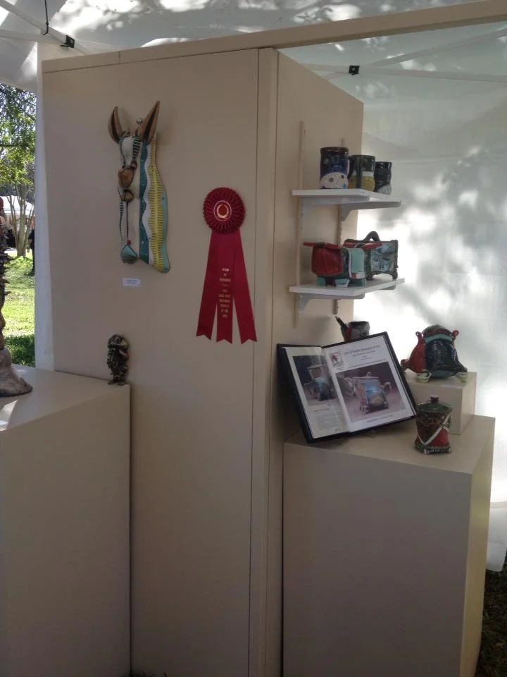 I just hung my "Award of Excellence" at the Lake Mary Heathrow Festival of the Arts.