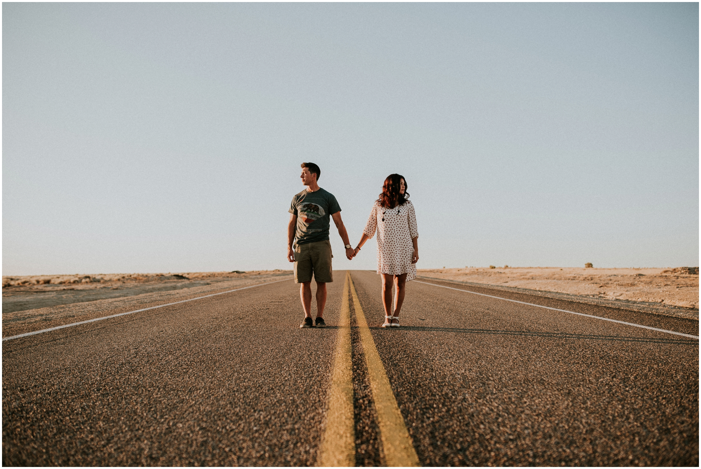 Makayla Madden Photography boise wedding and engagement photographer photography desert love holding hands roads leading lines swan falls