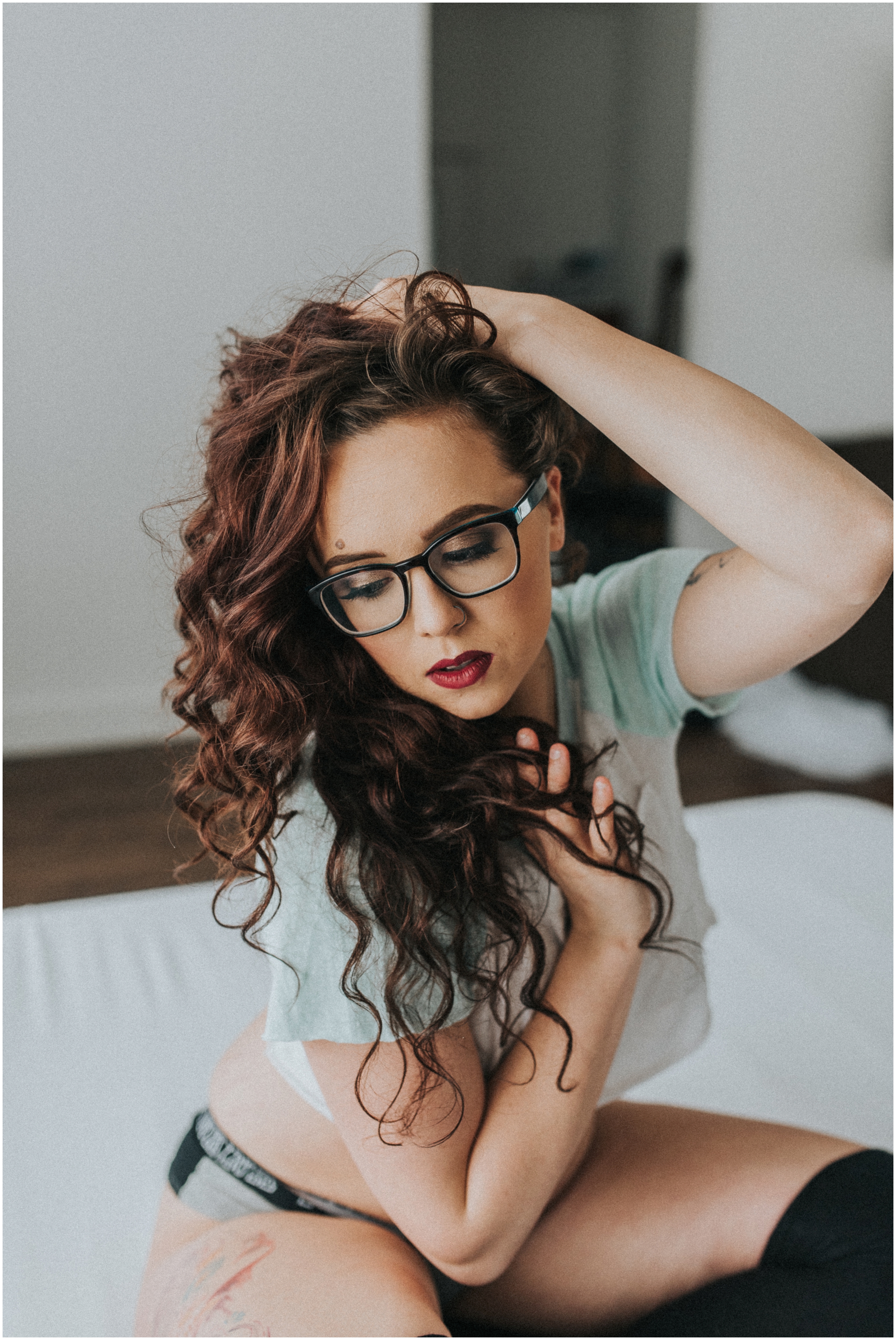 Boise Boudoir Photographer Boudoir By Kayla Makayla Madden Photography Sporty Sexy Boudoir Outfit Ideas Inspiration Tights Long Socks Glasses Tushy Tuesday Implied Nude Women's Portrait