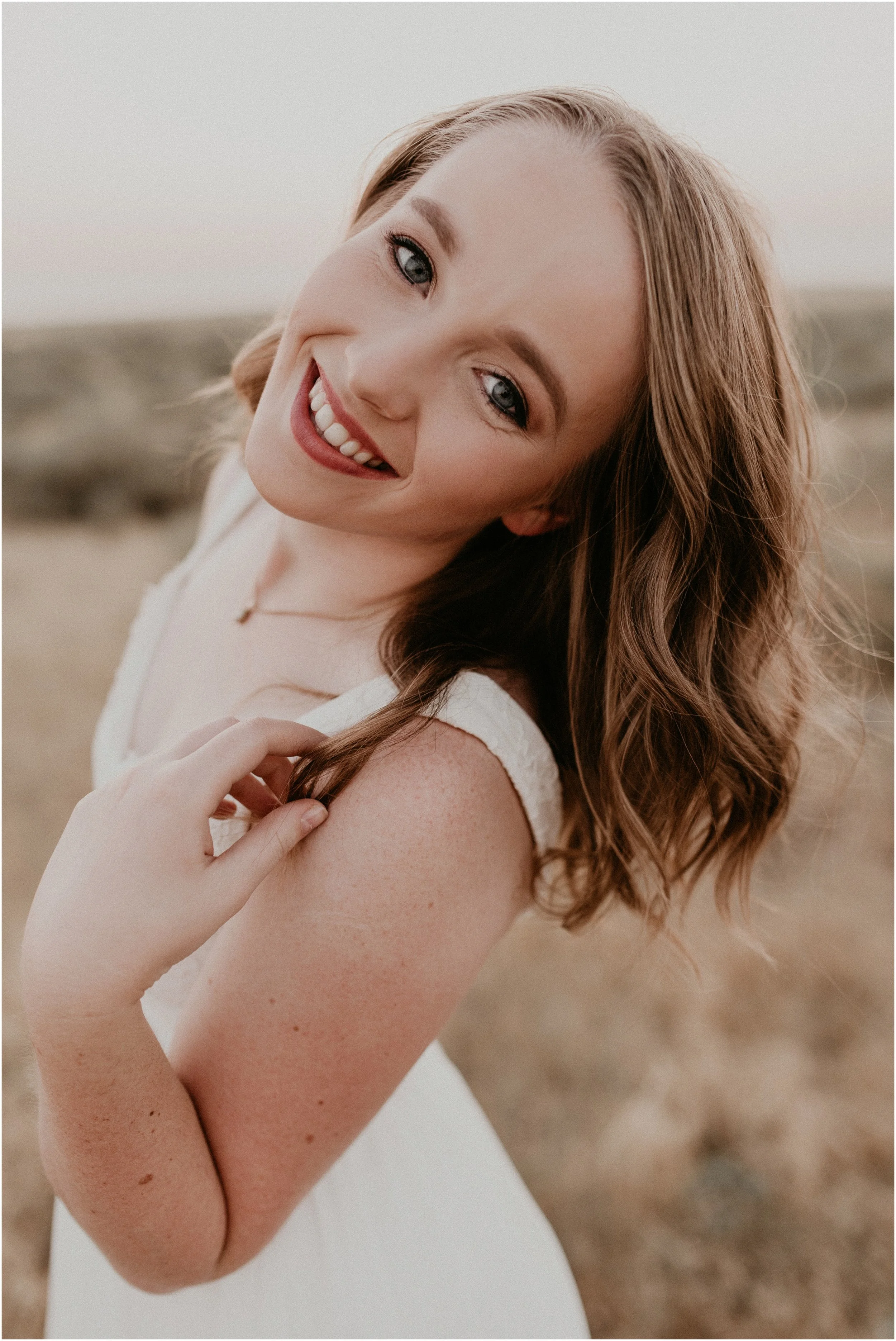 Boise Senior Photography Makayla Madden Photography Boise Idaho Foothills Sagebrush Desert Vintage Dress Bible Cole Valley Christian Summer Golden Hour