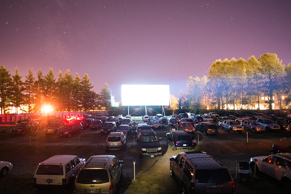 Movie goers watch "The Lone Ranger" from their cars at the 99W Drive-In movie theatre, in Newberg, OR. Photo by Chase Allgood