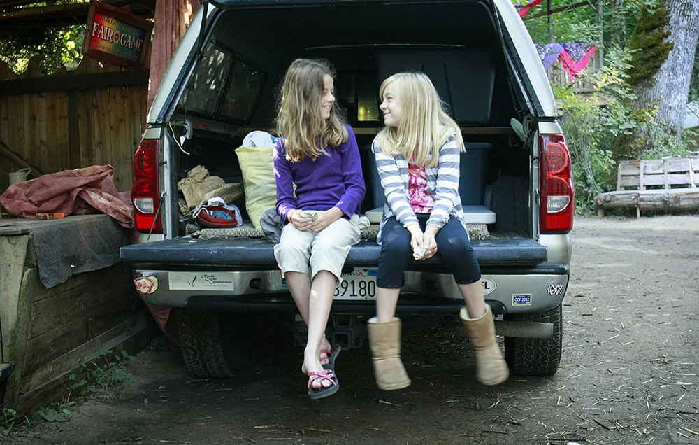 Best friends, Lily Hodges and Alyssa Morehead, spend girl time together during the Oregon Country Fair. Photo by Collin Andrew