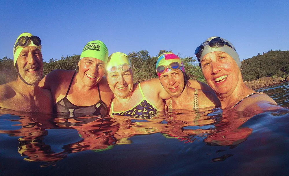 Rogue Valley Masters swimmers after completing their 5:45 am swim in Emigrant Lake in Ashland, Oregon. Photo by Geri Mathewson