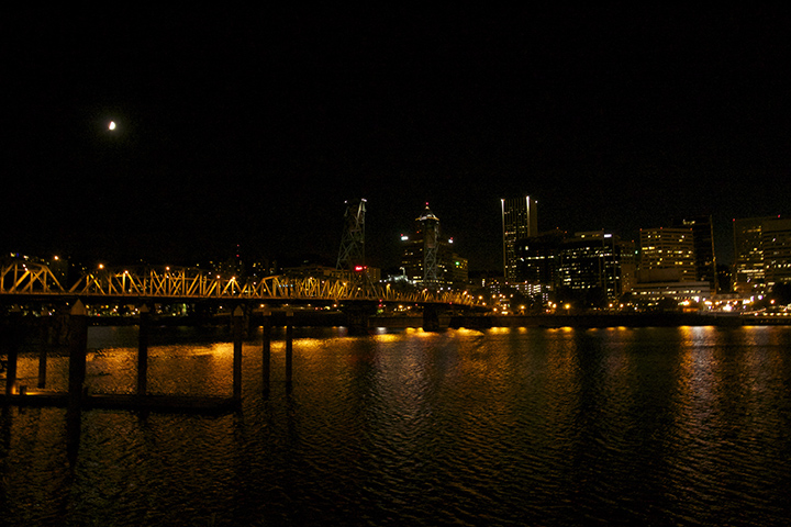 Moon, Hawthorne Bridge and Portland cityscape from the Vera Katz Esplanade under the Hawthrone Bridge ramp. Photo by Sue Zalokar