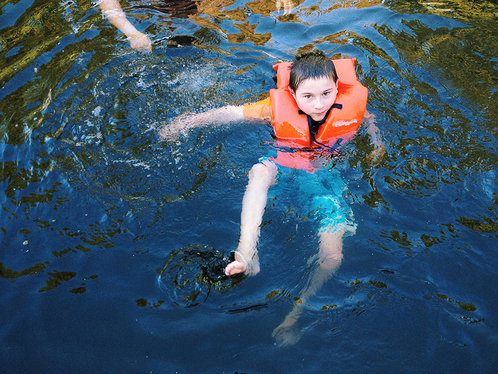 Eight-year-old Tyler Kish came to the ROck Creek Swimming Hole in Vernonia, Ore., to practice his swimming skills with his mother, Traci Kish. Photo by Natalie St. John