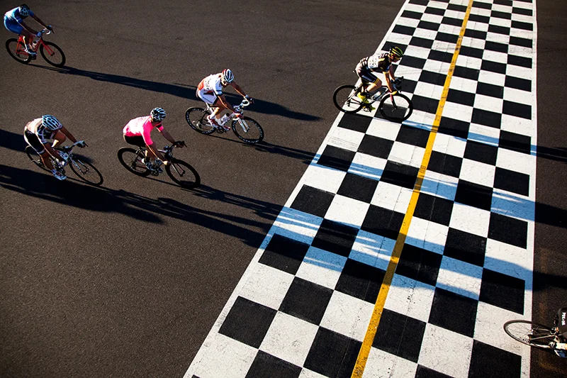 Cyclists race at Portland International Raceway. Photo by Tim LaBarge