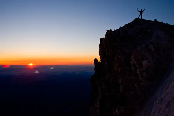 marbachp-Dick Arnold celebrates sunrise from summit of Mt Hood_1.jpg