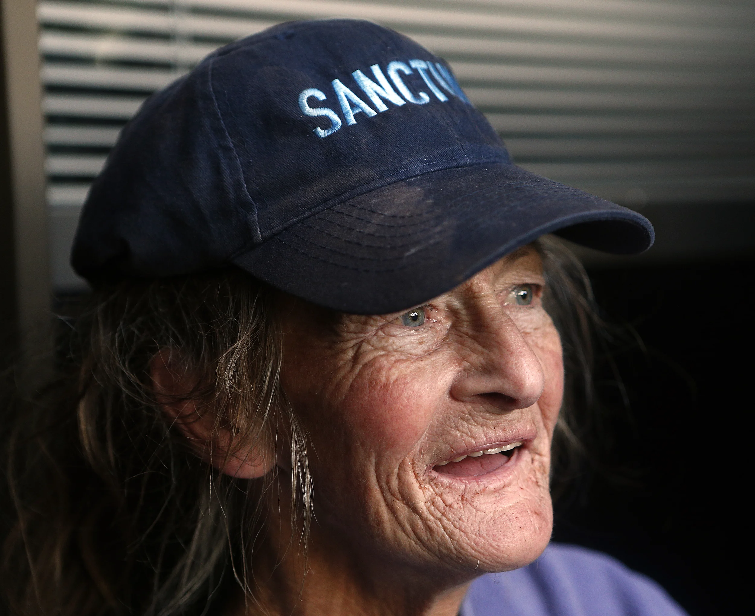 6:00 a.m. Susan Hughes sits in the secluded entry of a downtown Eugene office building where she often sleeps. The homeless woman is 64 and has lived on the streets of Eugene for years, unable to find permanent shelter. Hughes grew up in nearby Pleasant Hill and graduated from South Eugene High School. (Paul Carter/ The Register Guard)