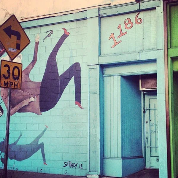Art + signage + great colours + a little grit = poetic street scene