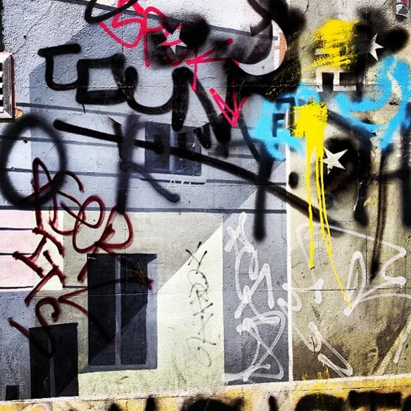 Layers of graffiti on a wall just off Portobello Road in Notting Hill. Yes, I love traditionally beautiful things and scenes, but I’m also attracted to a bit of grit. The combination of lyrical tags, alternation between hard lines and blurred edges and pops of bright colour against a slightly textured neutral background draw me in