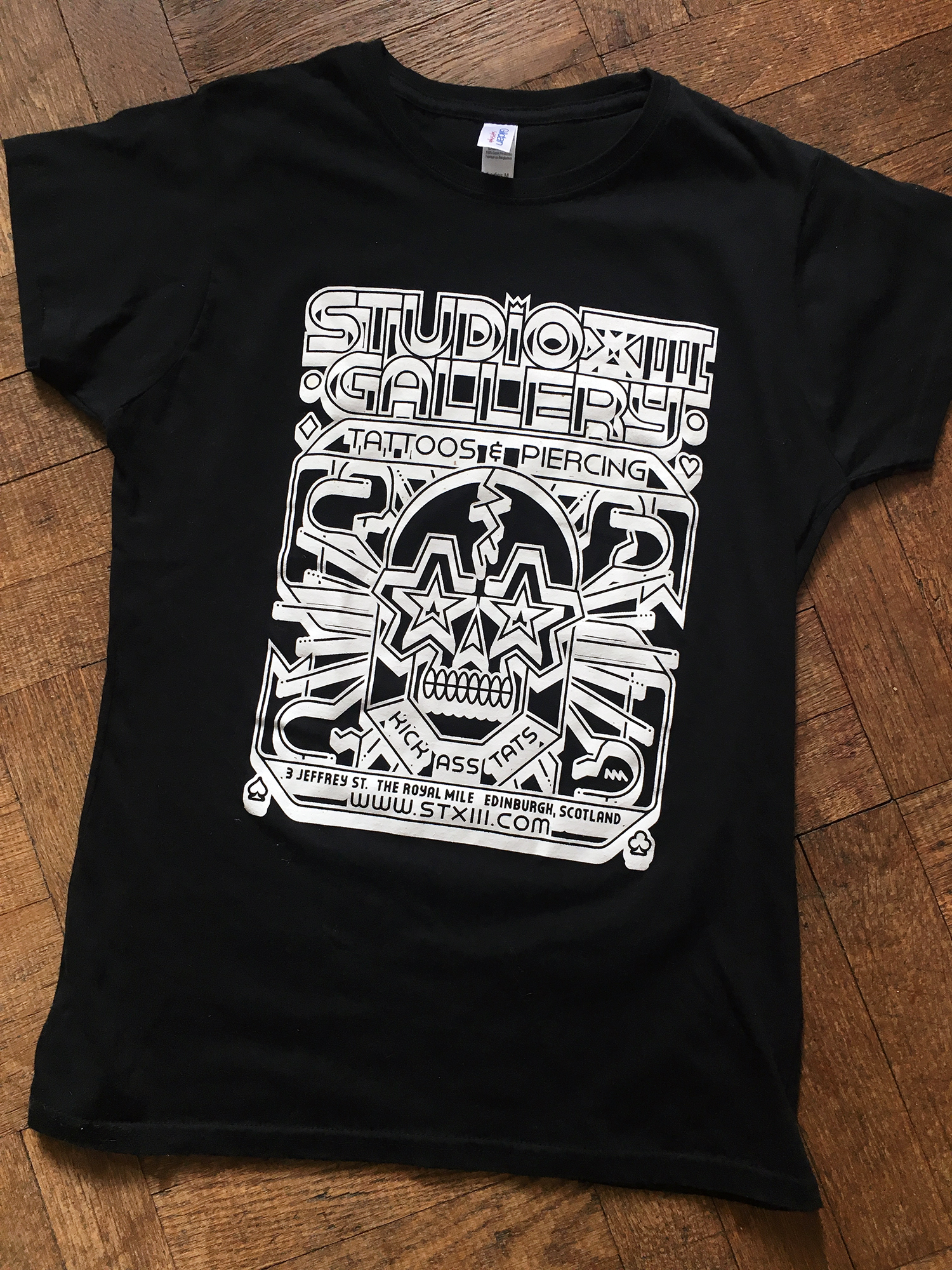 STUDIO XIII GALLERY - TATTOOS & PIERCING Commissioned illustration specific to my style for posters and t-shirts.